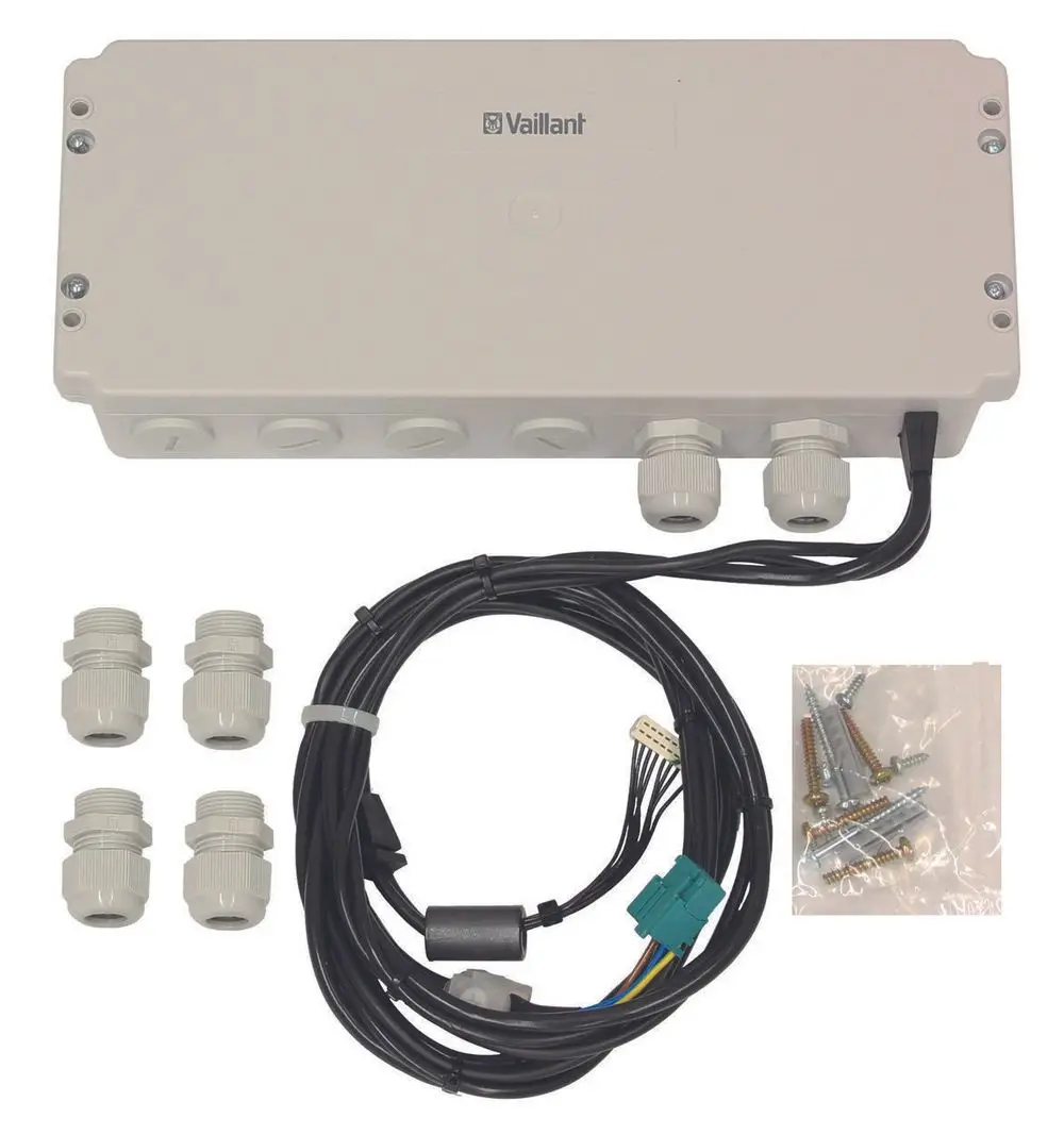 Vaillant Zubehör bestehend aus einem grauen Anschlusskasten, Kabelbäumen, vier Dichtungen und einer Tüte mit Schrauben.